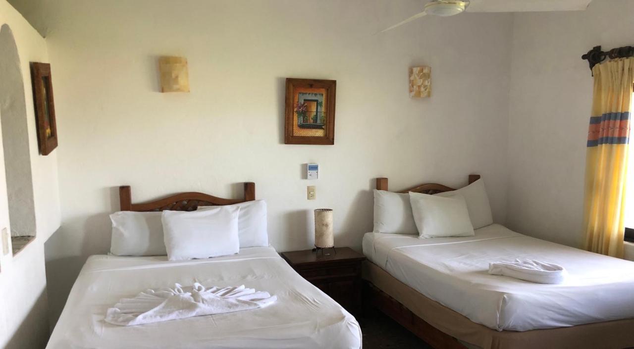 פוארטו אסקונדידו Hotel Arcoiris מראה חיצוני תמונה