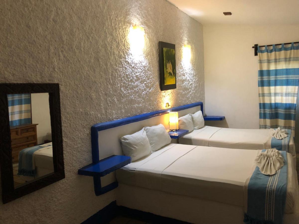 פוארטו אסקונדידו Hotel Arcoiris מראה חיצוני תמונה